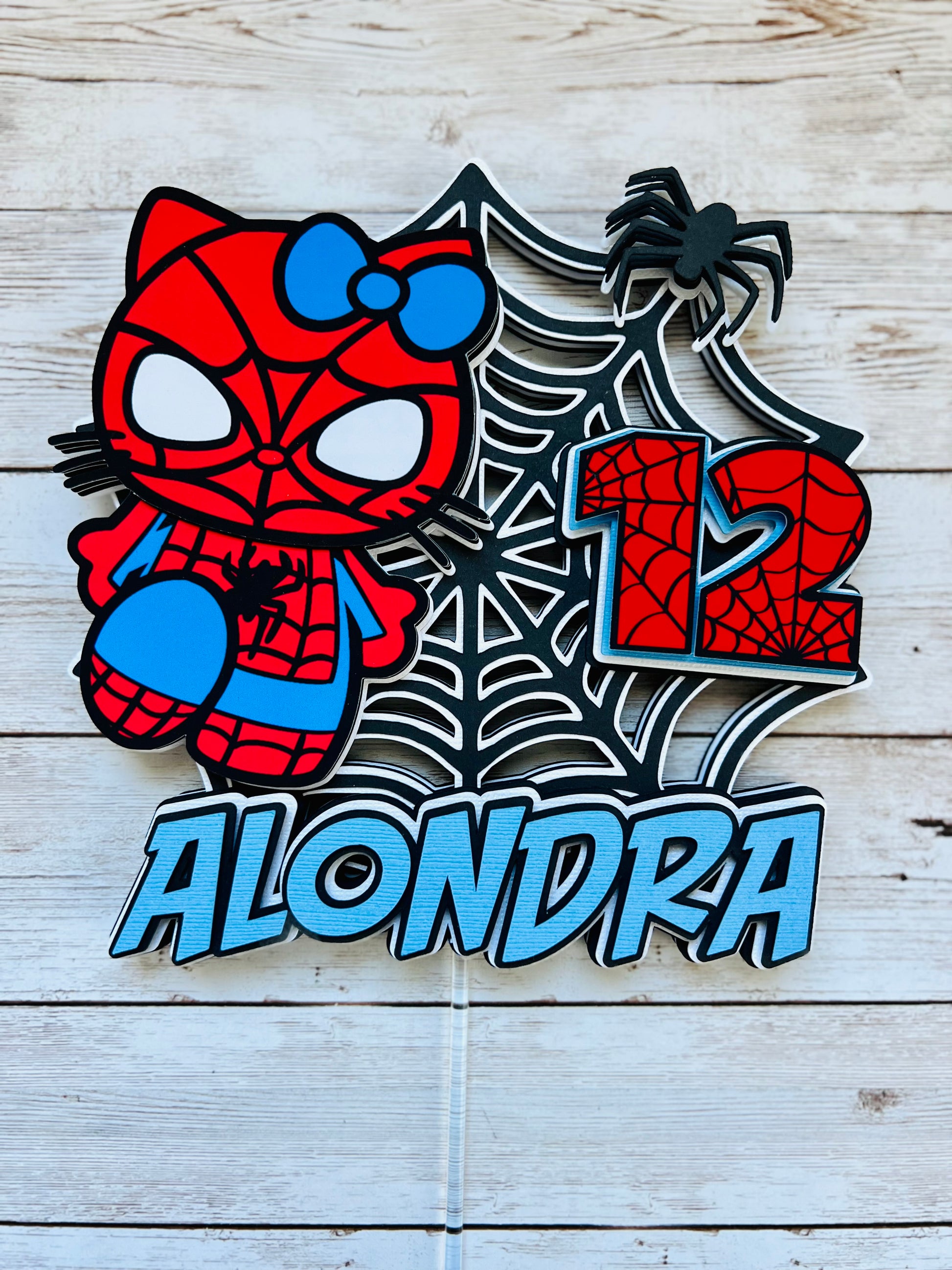 hello kitty spiderman cake topper