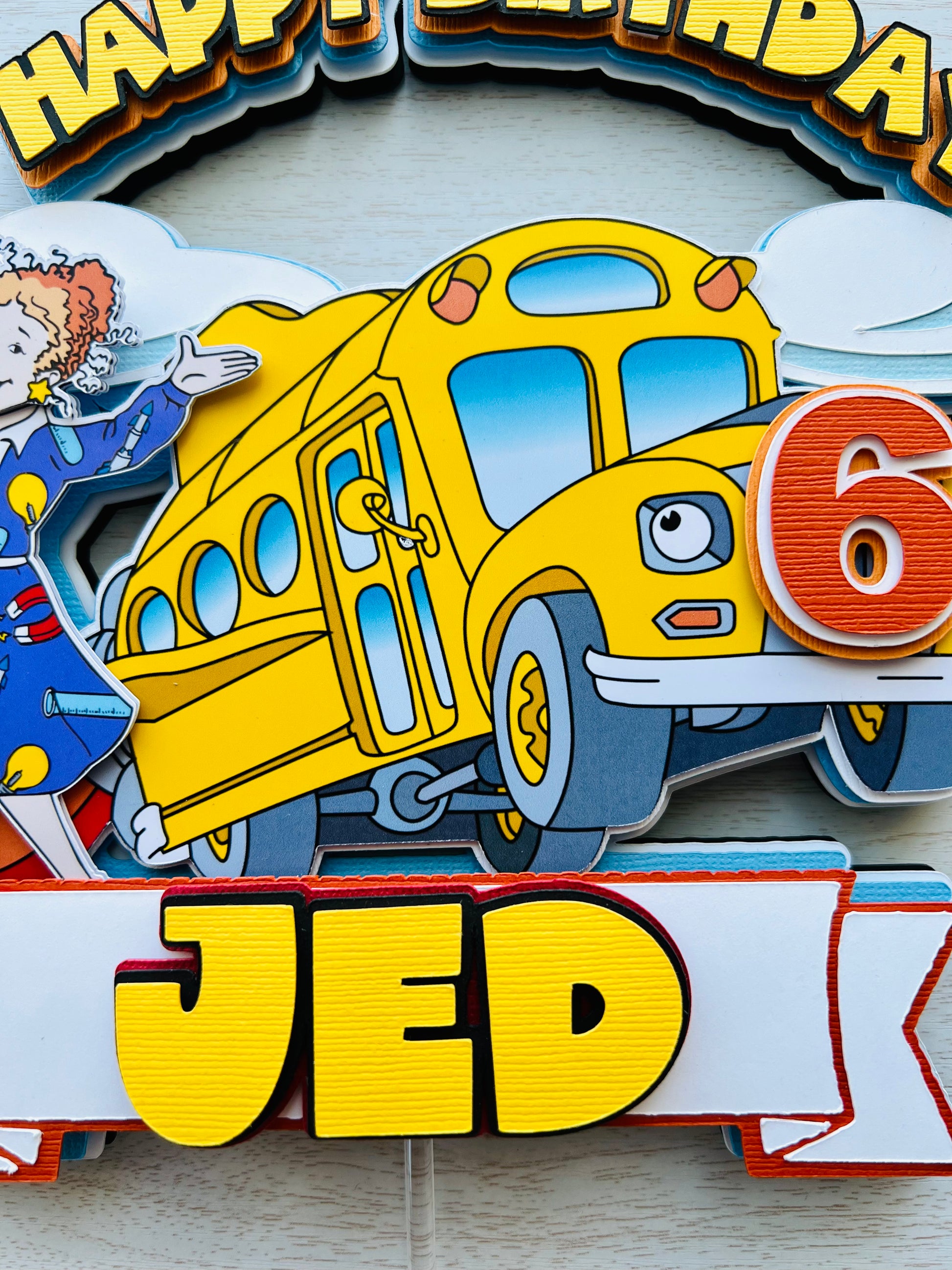 the magic school bus cake topper