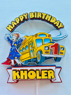 The magic school bus cake topper