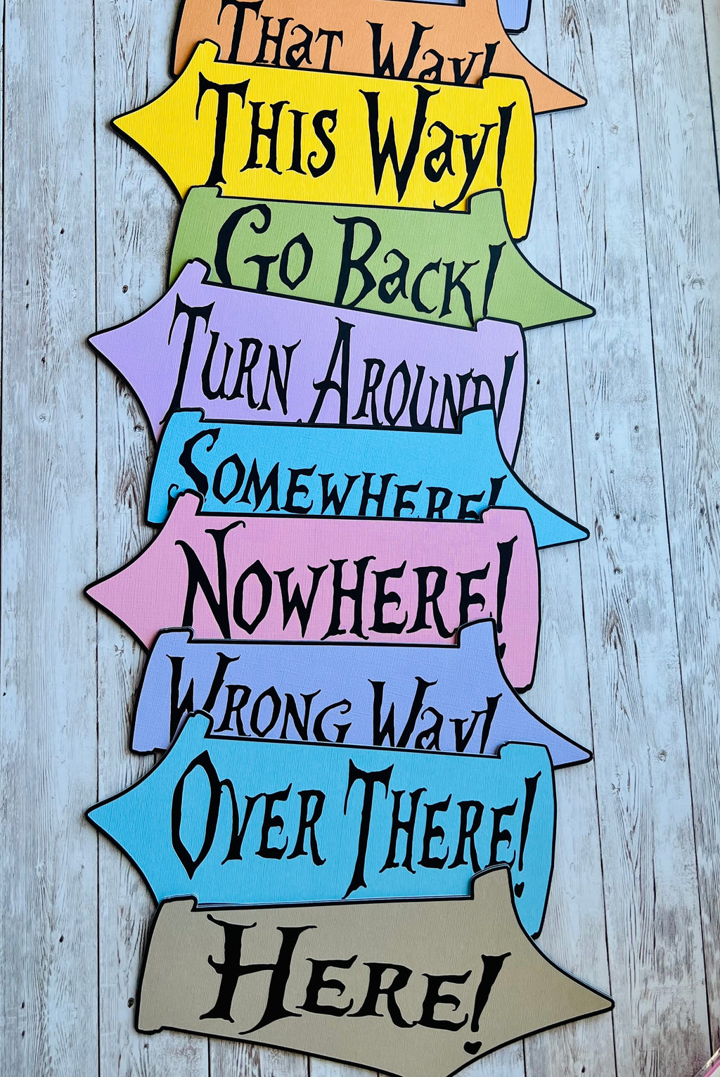 Wonderland Arrow Signs