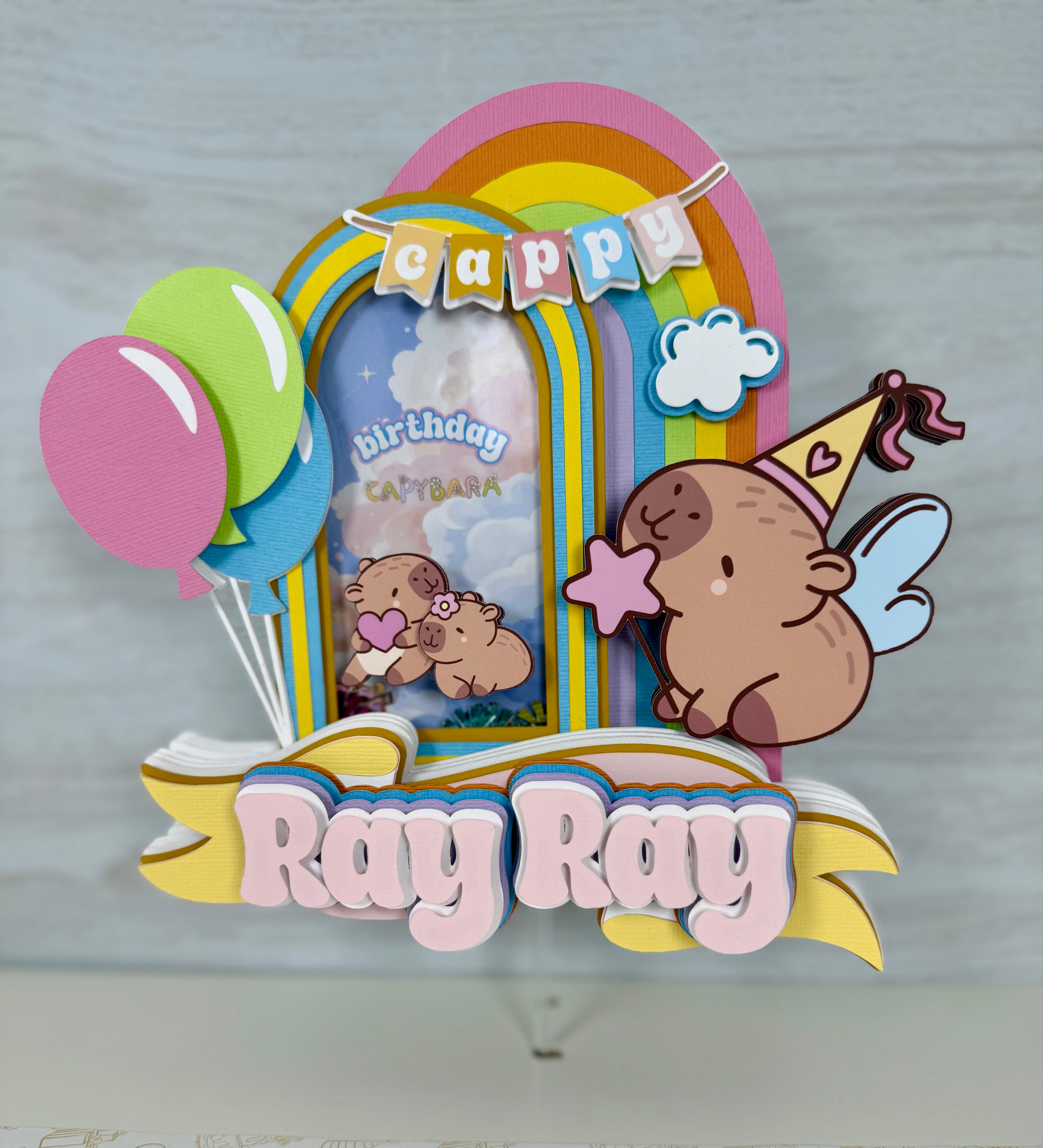 Capybara cake topper