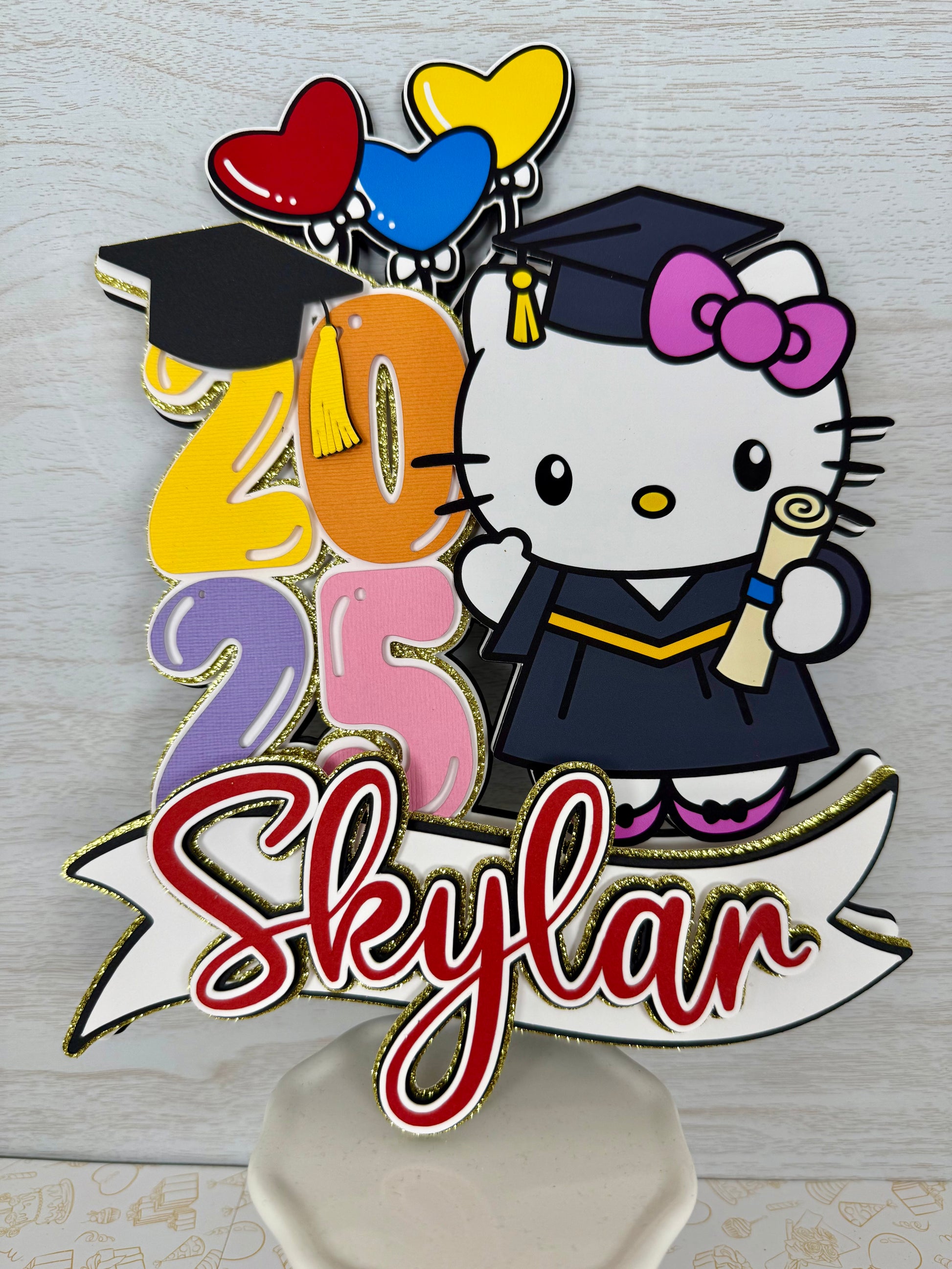 Hello kitty Graduation cake topper