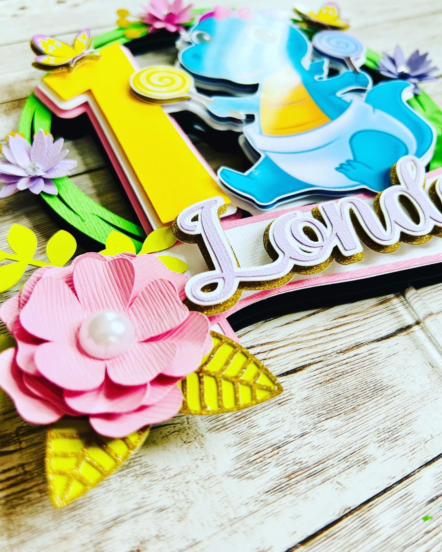 dino baby cake topper