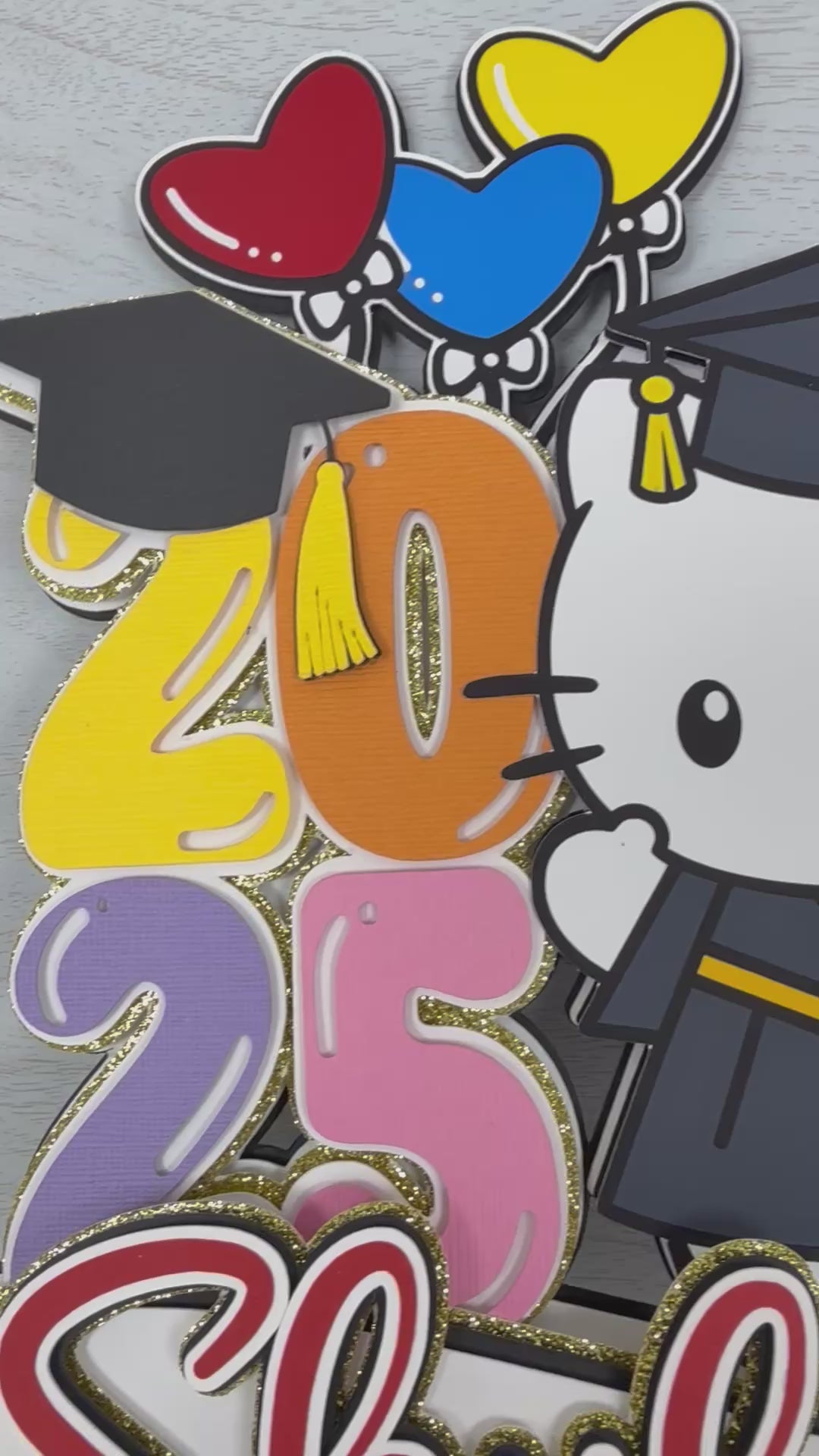 Hello kitty graduation cake topper