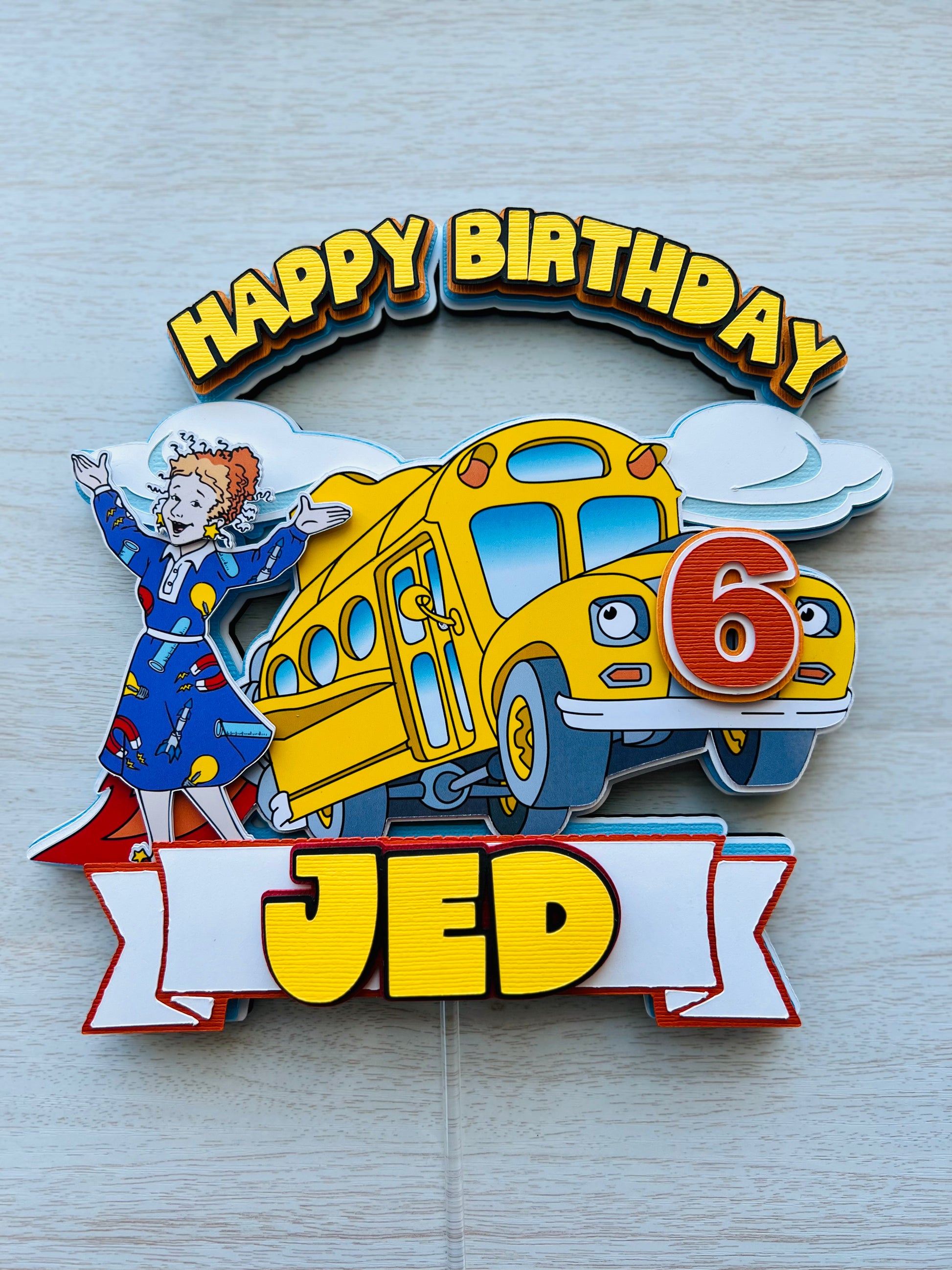 the Magic school bus cake topper